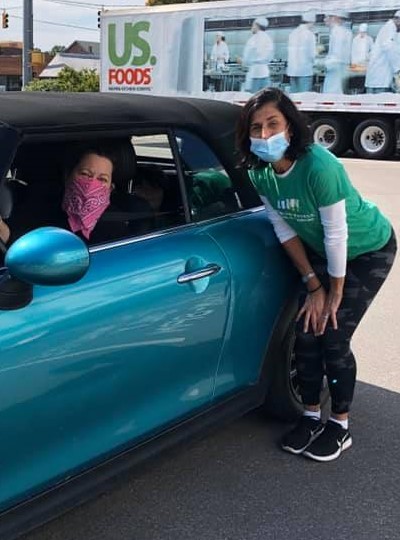 greeting a car at the 2020 dining for others